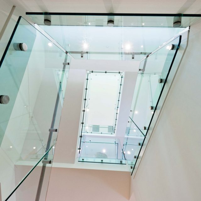 Custom Stairs with Glass Railing in Vancouver | Rockridge Fine Homes