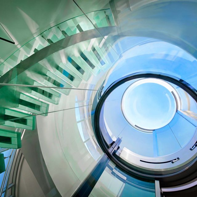 Architectural Glass Elevator Detail Photography by Falcon Homes