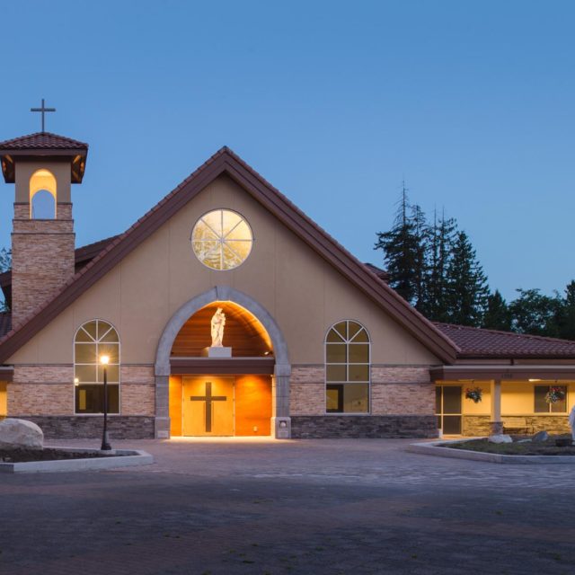 St Clare of Assisi Parish Church Exterior at Dusk by Keystone Architecture