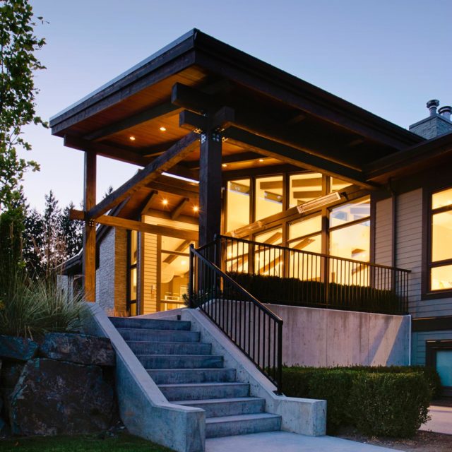 Modern Home Exterior at Dusk by Rockridge Developments